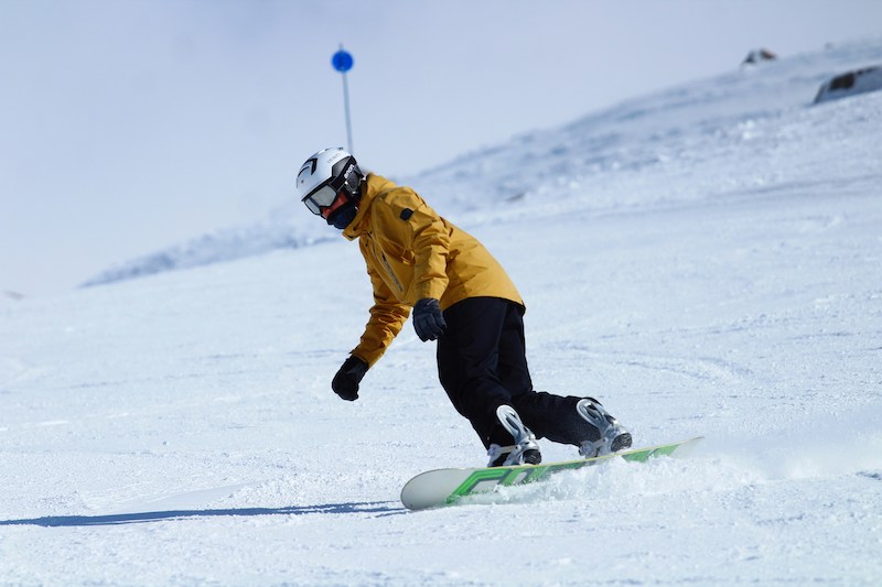 Rider on a traditional camber board