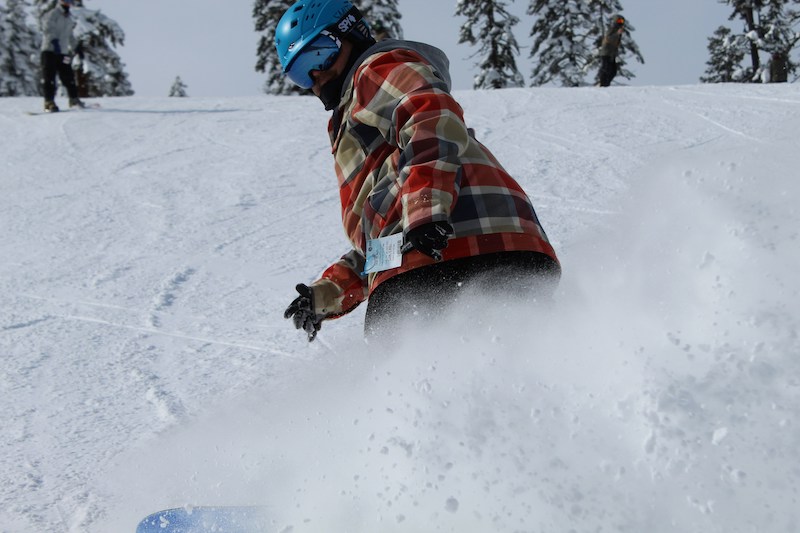 Slowing down on a snowboard