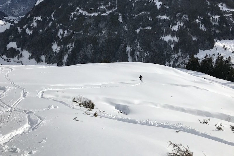 snowboarding powder in back country