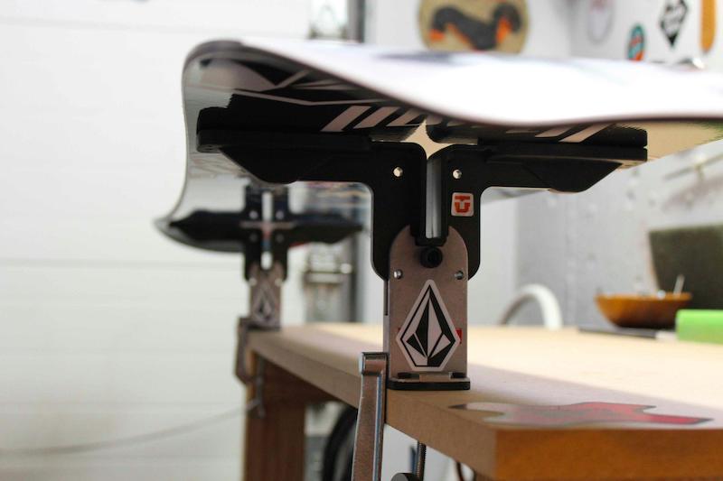 Snowboard at a work bench - end of season